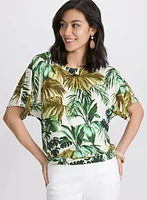 Haut à motif de feuilles tropicales
