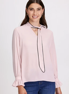 Blouse à col noué et manches longues