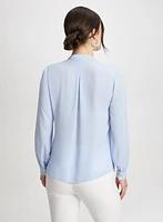 Blouse à plis avec ruban nouer