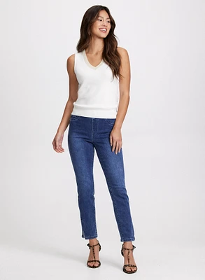 Sleeveless V-Neck Sweater & Embellished Hem Slit Jeans