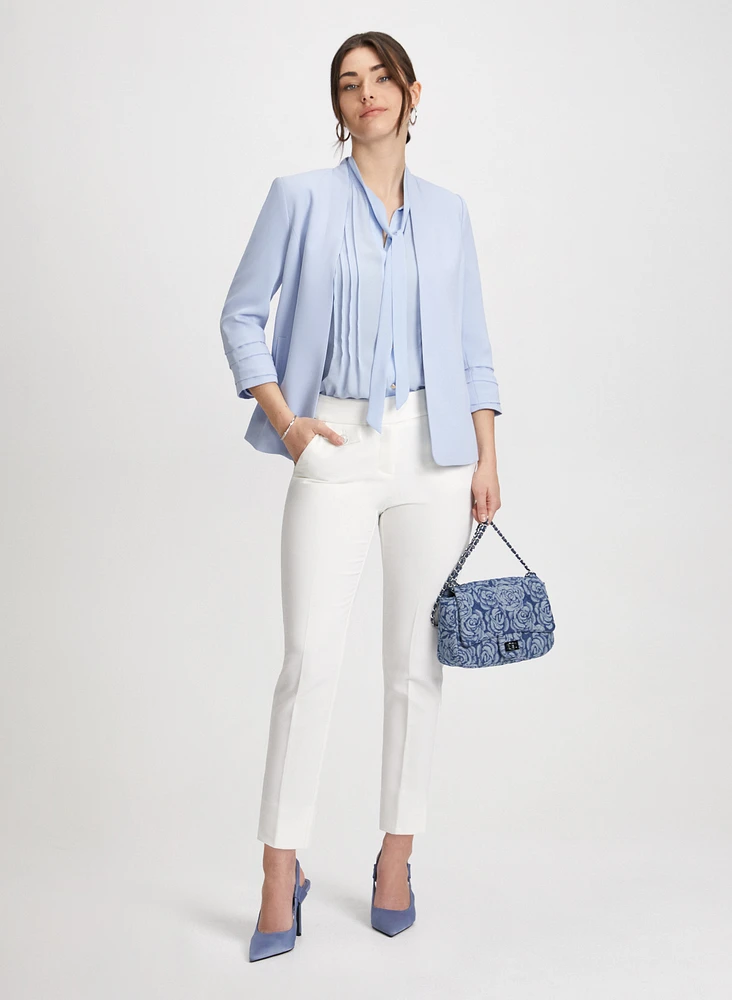 Blouse à plis avec ruban nouer