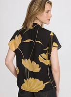 Blouse florale à encolure nouée