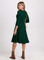 Robe en tricot à jupe plissée