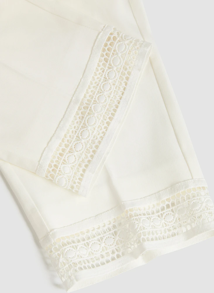 Pantalon à enfiler avec ourlet en dentelle