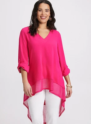 Blouse asymétriques à manches repliées