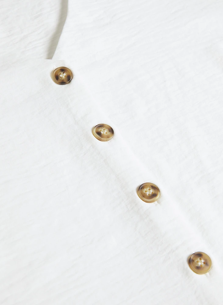 Sleeveless Button-Down Blouse