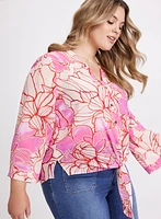 Blouse florale à ourlet noué