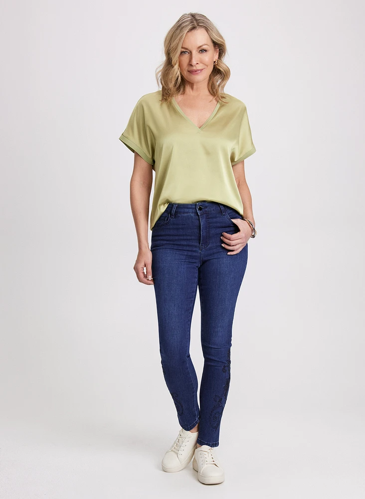 Embroidered Hem Slim Leg Jeans