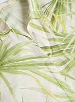 Blouse tropicale à ourlet noué