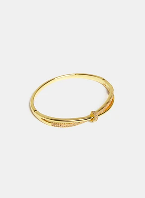 Bracelet jonc à effet croisé et pierres