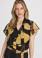 Blouse florale à encolure nouée