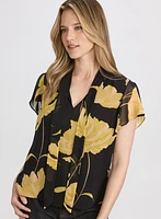 Blouse florale à encolure nouée