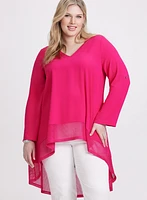 Blouse asymétriques à manches repliées