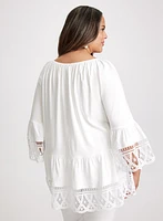 Blouse à volant et broderies décoratives