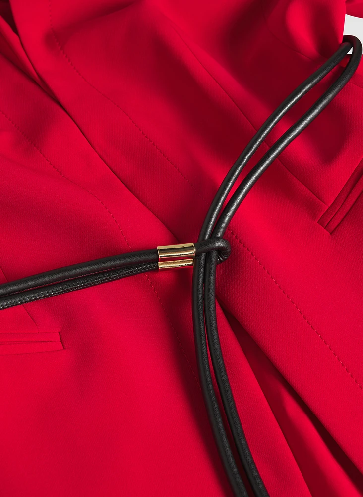 Veste longue à ceinture