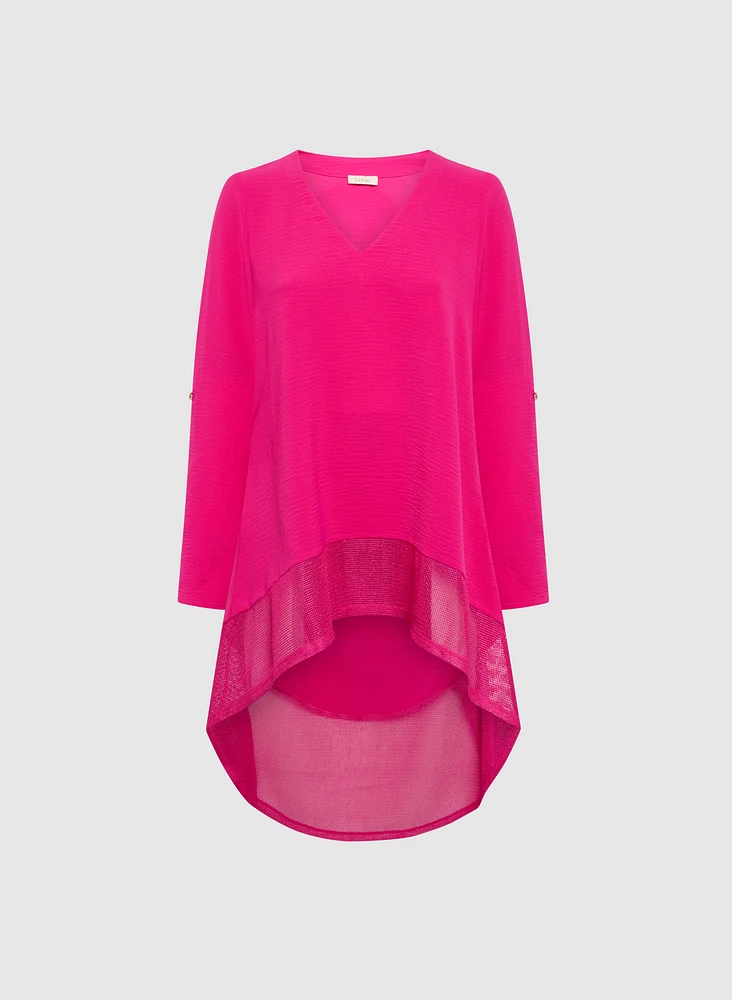 Blouse asymétriques à manches repliées