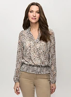 Animal print top with smocked waist