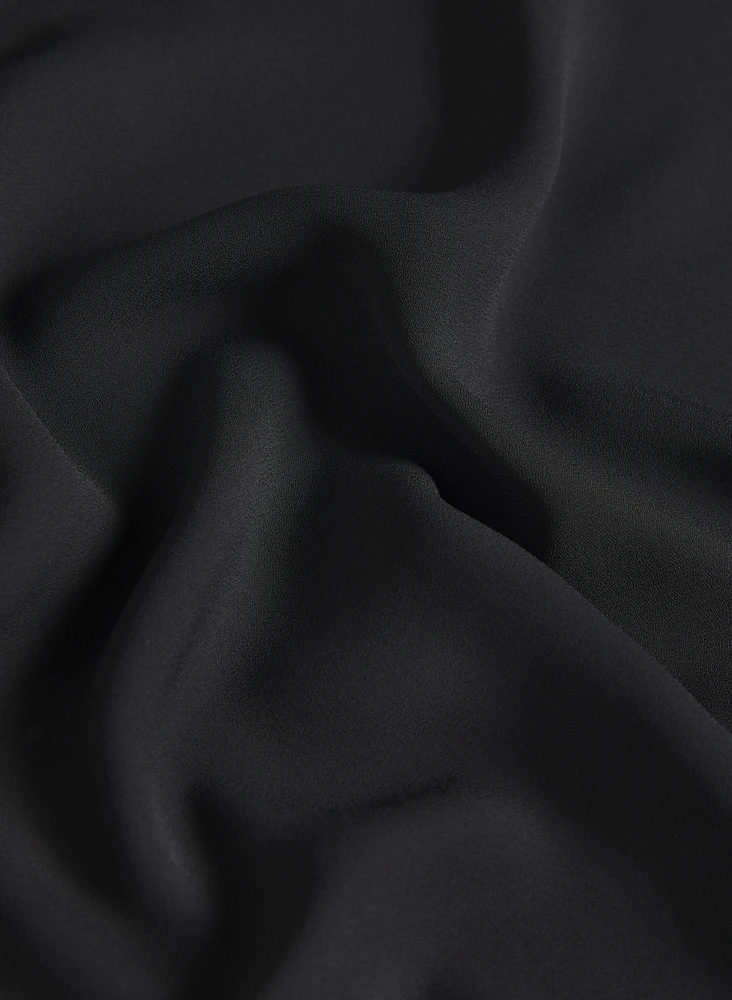 Blouse à ourlet bullé