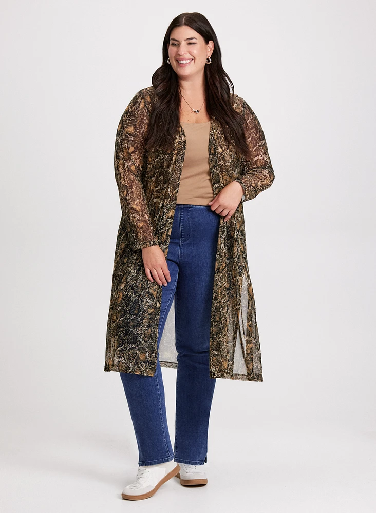 Cardigan peau de serpent et jean fendu orné