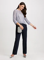 Pull ajouré à manches 3/4 et pantalon à jambe droite