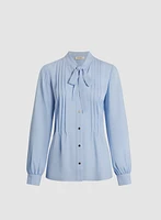 Blouse à plis avec ruban nouer