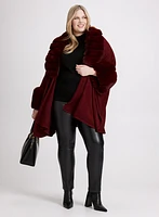 Poncho à encolure et poignets en fausse fourrure