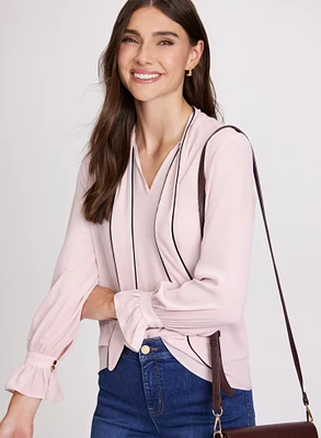 Blouse à col noué et manches longues