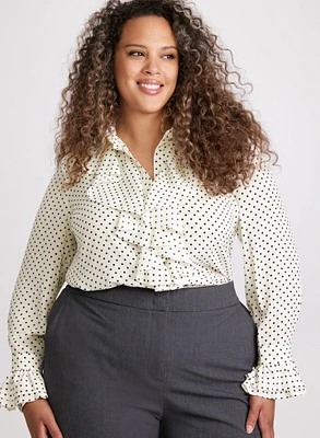 Blouse à volants et motif pois