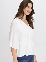 Blouse boutonnée à manches évasées