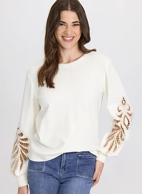 Haut à broderies ajourées