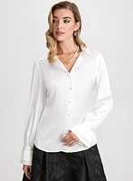 Blouse en satin à manches volantées