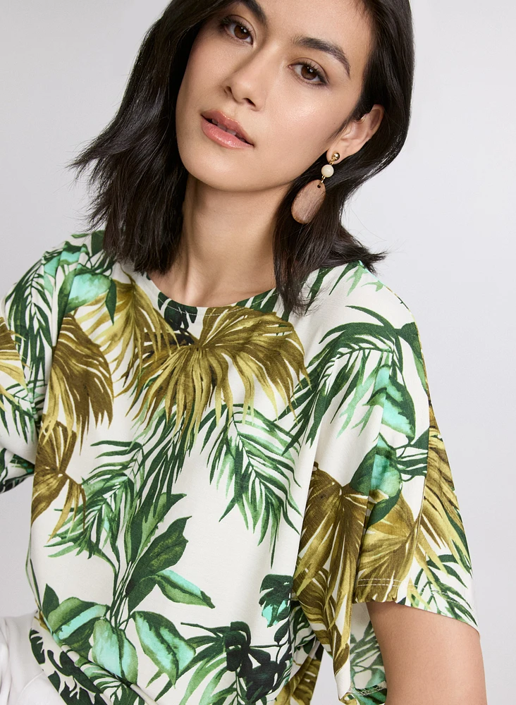 Haut à motif de feuilles tropicales