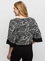 Haut à motif de feuilles abstrait