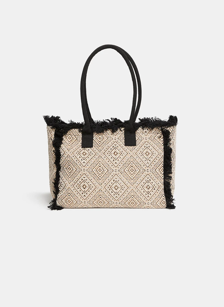 Sac à main à motif diamant et franges