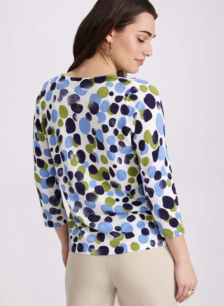 Pull à pois abstraits