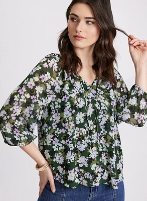 Blouse florale à encolure nouée