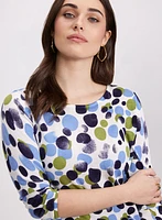 Pull à pois abstraits