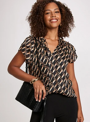 Blouse à manches étagées et motif géométrique