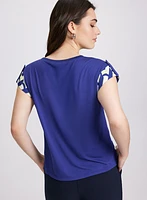 Haut à motif géométrique