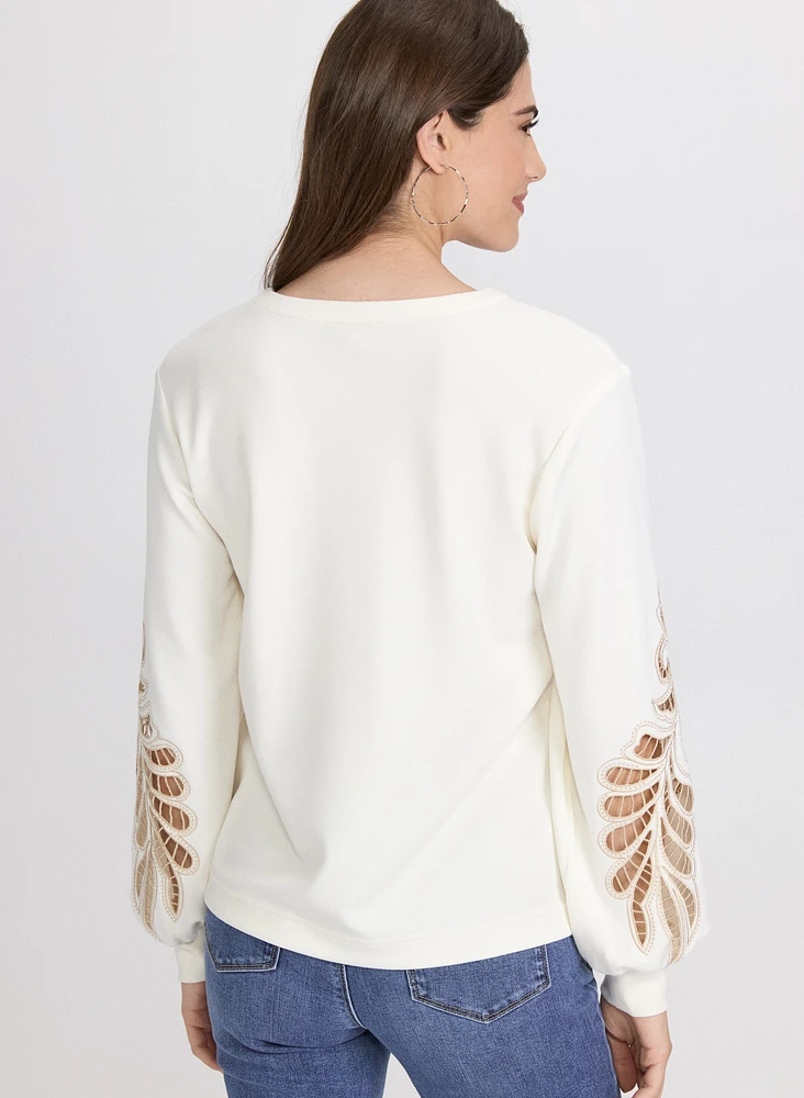 Haut à broderies ajourées