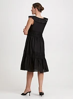 Robe ajustée et évasée volantée