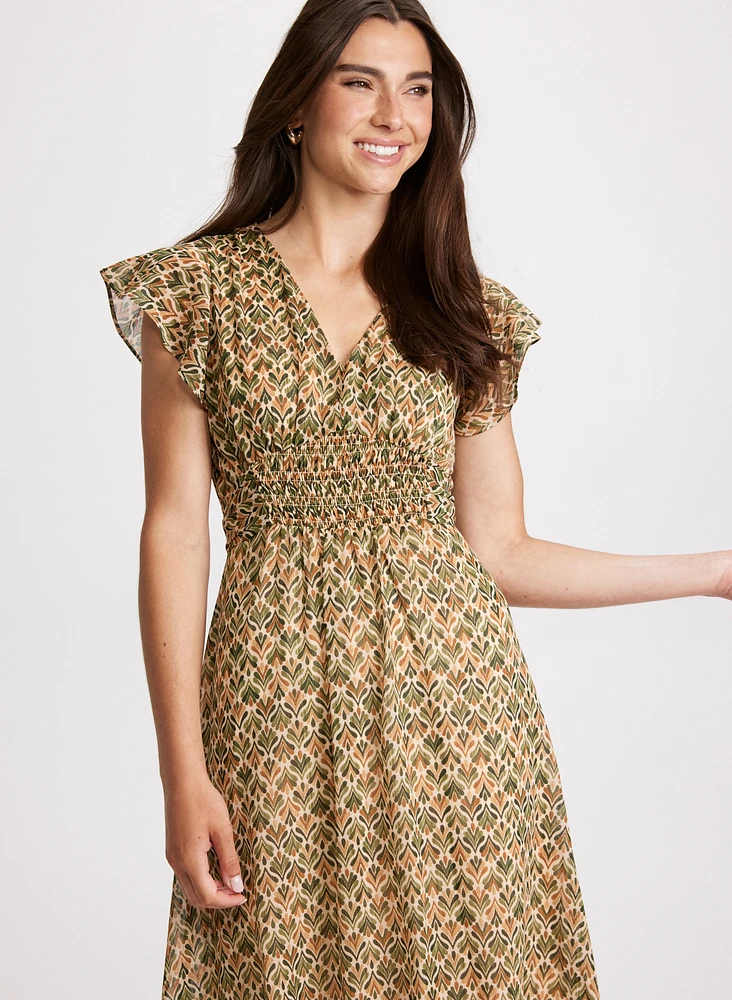 Robe à taille froncée et motif feuilles abstrait