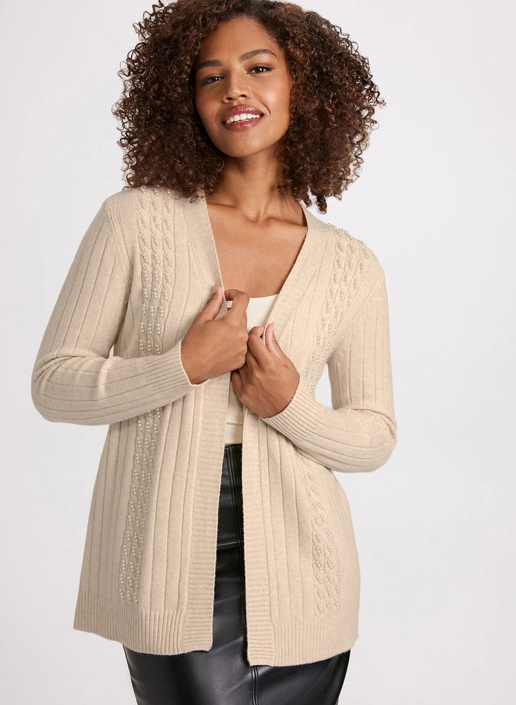 Cardigan à mailles torsadées et perles
