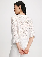 Blouse boutonnée à oeillets