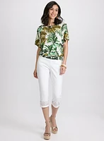 Haut à motif de feuilles tropicales