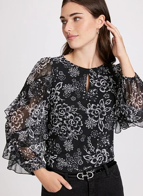 Blouse à motif floral et manches volantées