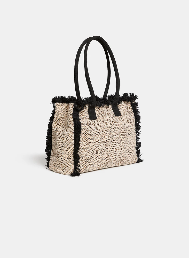 Sac à main à motif diamant et franges