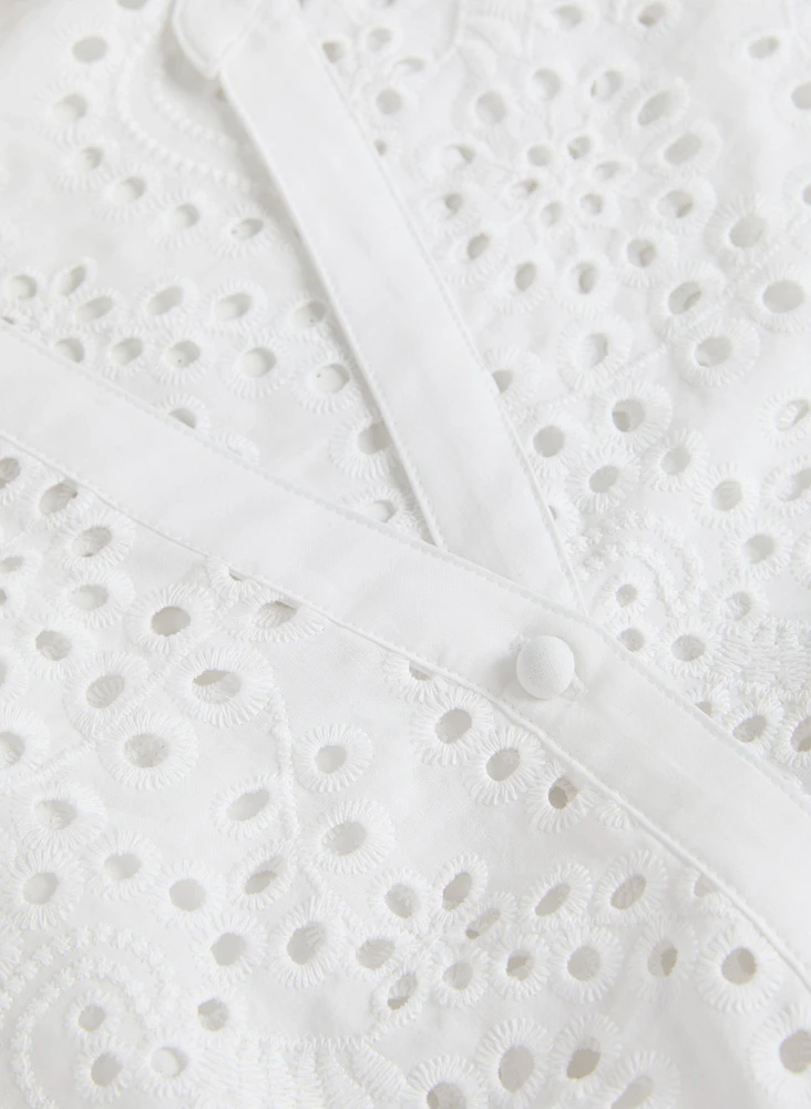Blouse boutonnée à oeillets
