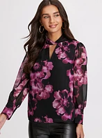 Blouse florale à col torsadé