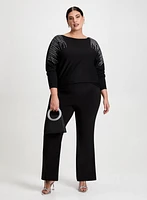 Pull à pierres du Rhin et pantalon semi-évasé